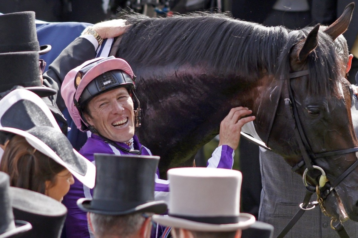 Padraig Beggy dismounts after winning the Derby Stakes with Wings Of Eagles. Photo: Racing UK