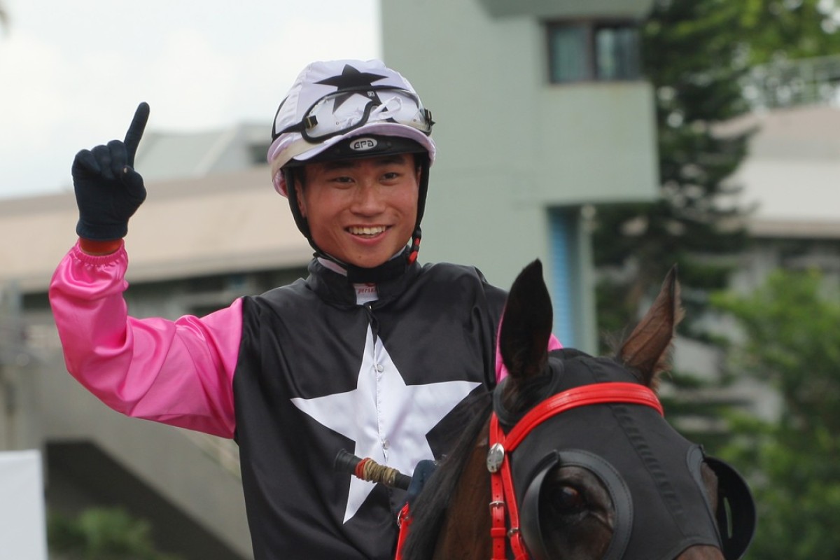 Dylan Mo is all smiles after another dirt win last Sunday at Sha Tin. Photos: Kenneth Chan.
