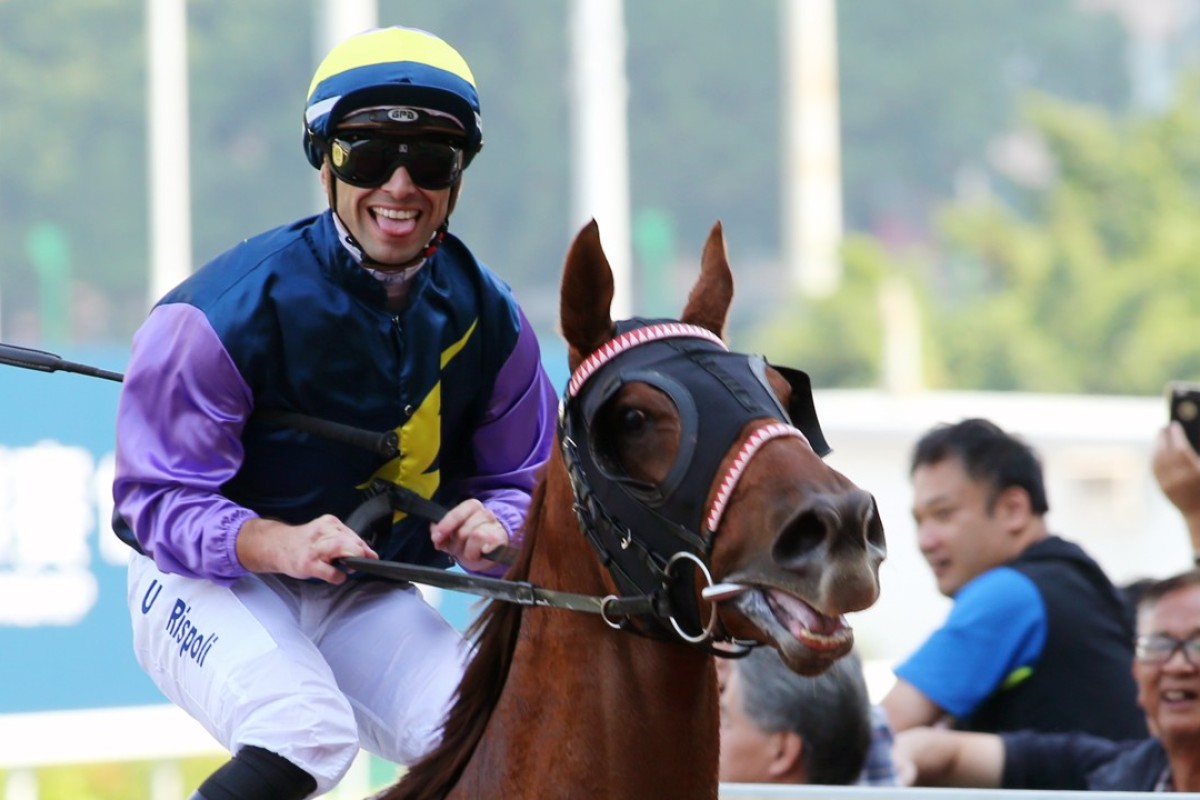 Umberto Rispoli is all smiles as completes a double at Happy Valley on Sunday. Photos: Kenneth Chan