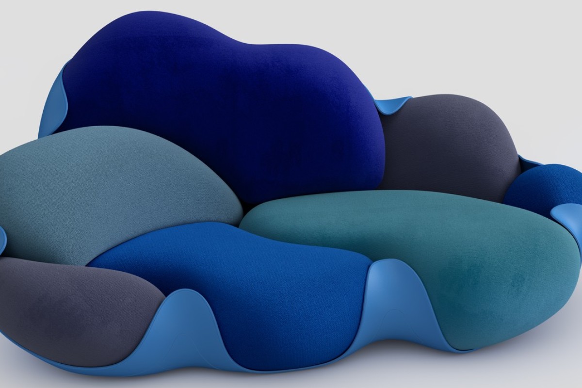 The Bomboca Sofa features eight removable cushions arranged in a rigid, leather-covered shell.