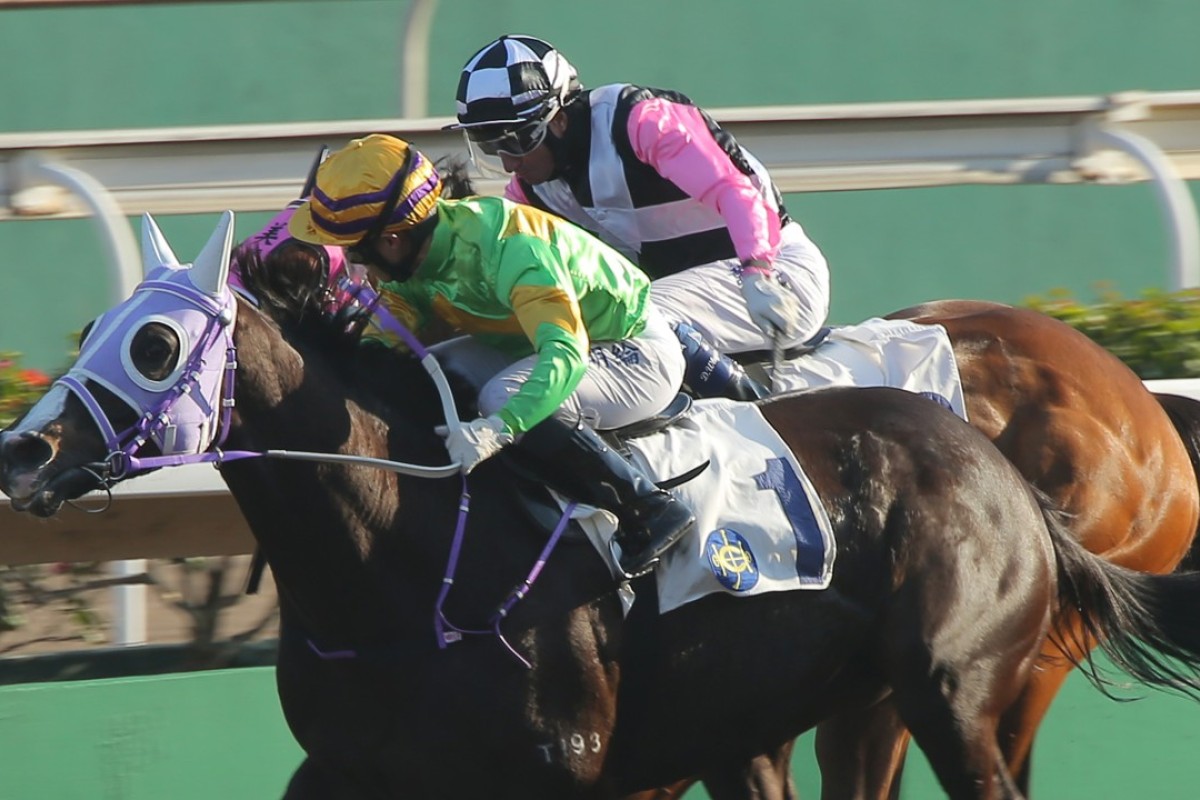 Keith Yeung drives Classic Emperor to victory at Sha Tin on Saturday. Photos: Kenneth Chan