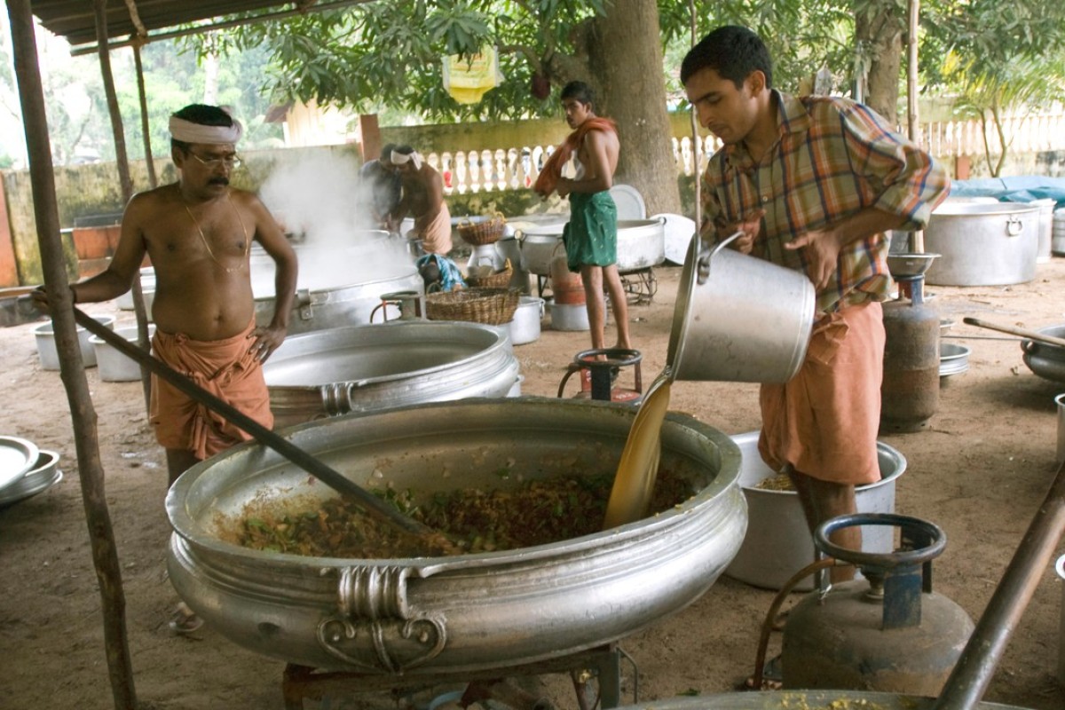 A khichdi feast is prepared in Mannarsala, Kerala. Picture: Alamy