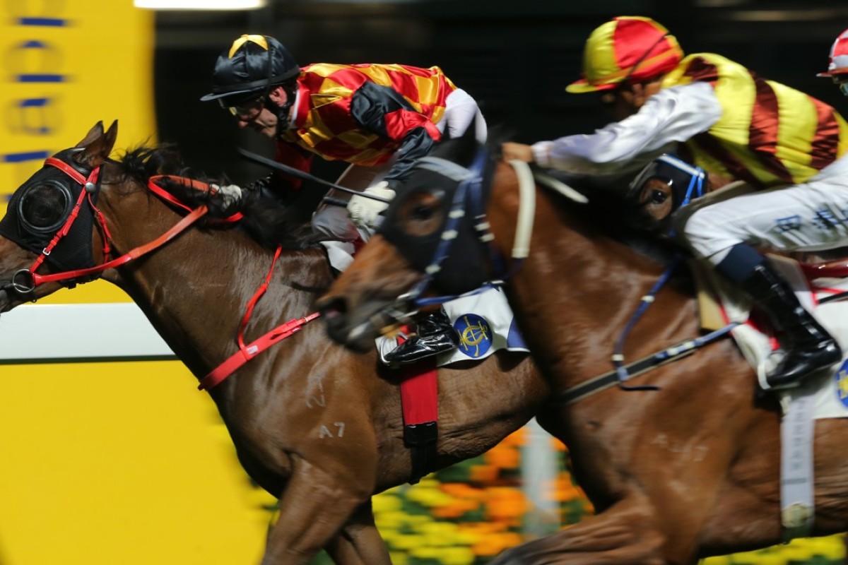 Olivier Doleuze drives Bond Elegance to victory at Happy Valley on Wednesday night. Photo: Kenneth Chan