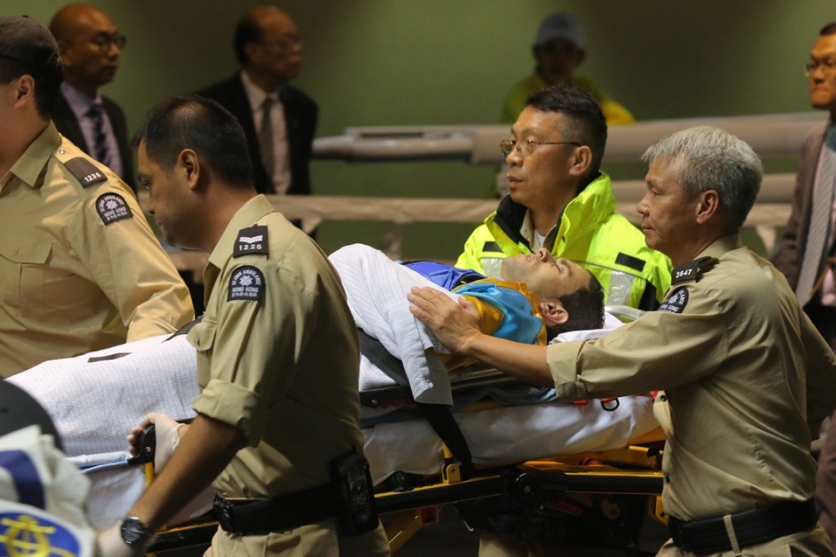 Umberto Rispoli is taken to hospital after a fall at Happy Valley in November 2016. Photos: Kenneth Chan.