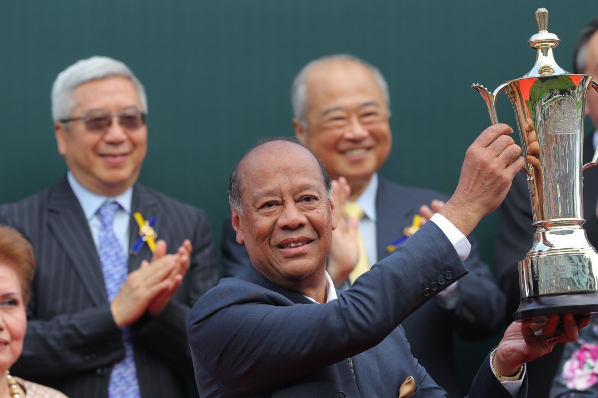 Kerm Din collects the QE II Cup trophy. Photos: Kenneth Chan