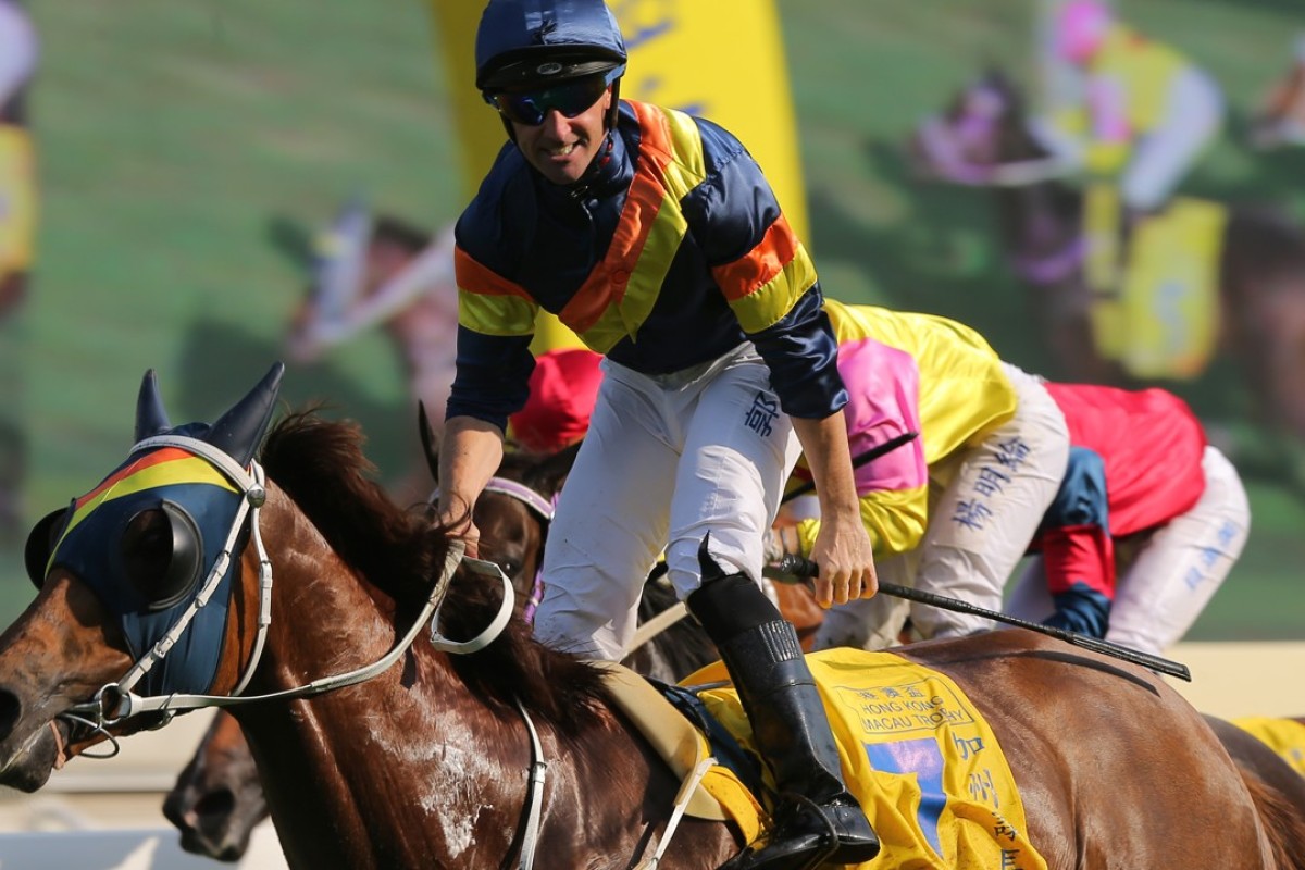 A jubilant Neil Callan salutes on California Whip. Photos: Kenneth Chan