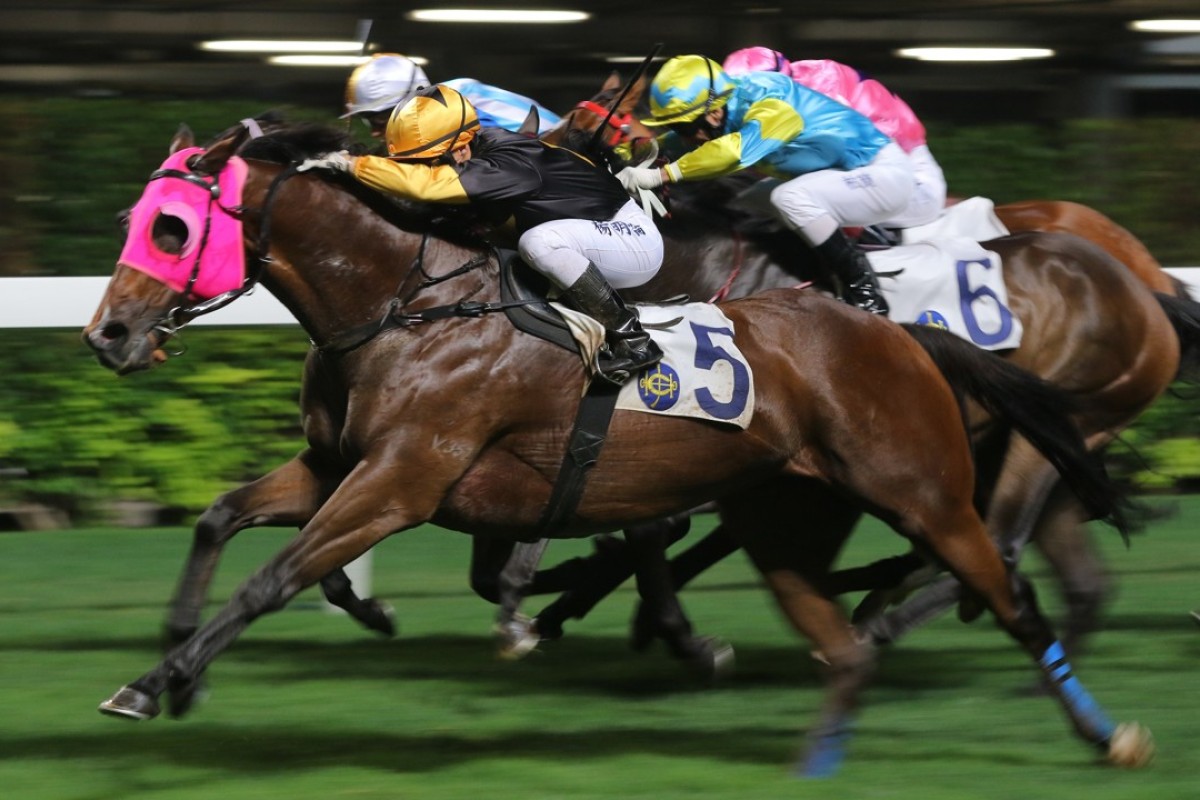 Keith Yeung drives Top Score to victory at Happy Valley in April. Photos: Kenneth Chan