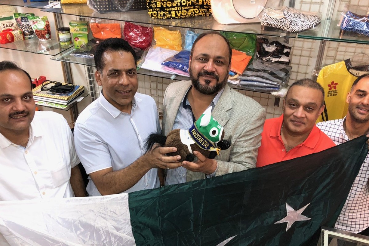 Mohammad Ilyas, Bhatti Saeed, Jawad Ashraf, Mian Rasheed and Shahid Mubeen with a Pakistan Star plushie. Photo: Michael Cox