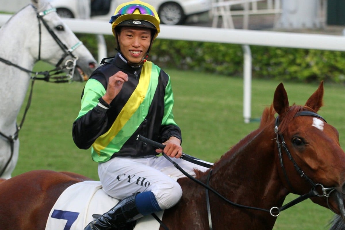 Vincent Ho returns to scale after winning with Ugly Warrior on Saturday. Photos: Kenneth Chan