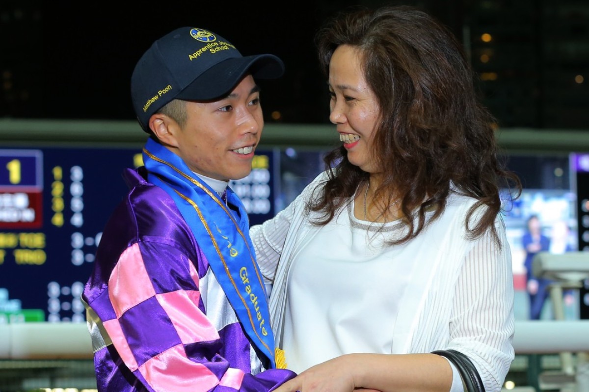 Matthew Poon is congratulated by his mother after collecting his 70th winner and graduating from the Apprentice Jockeys’ School. Photos: Kenneth Chan