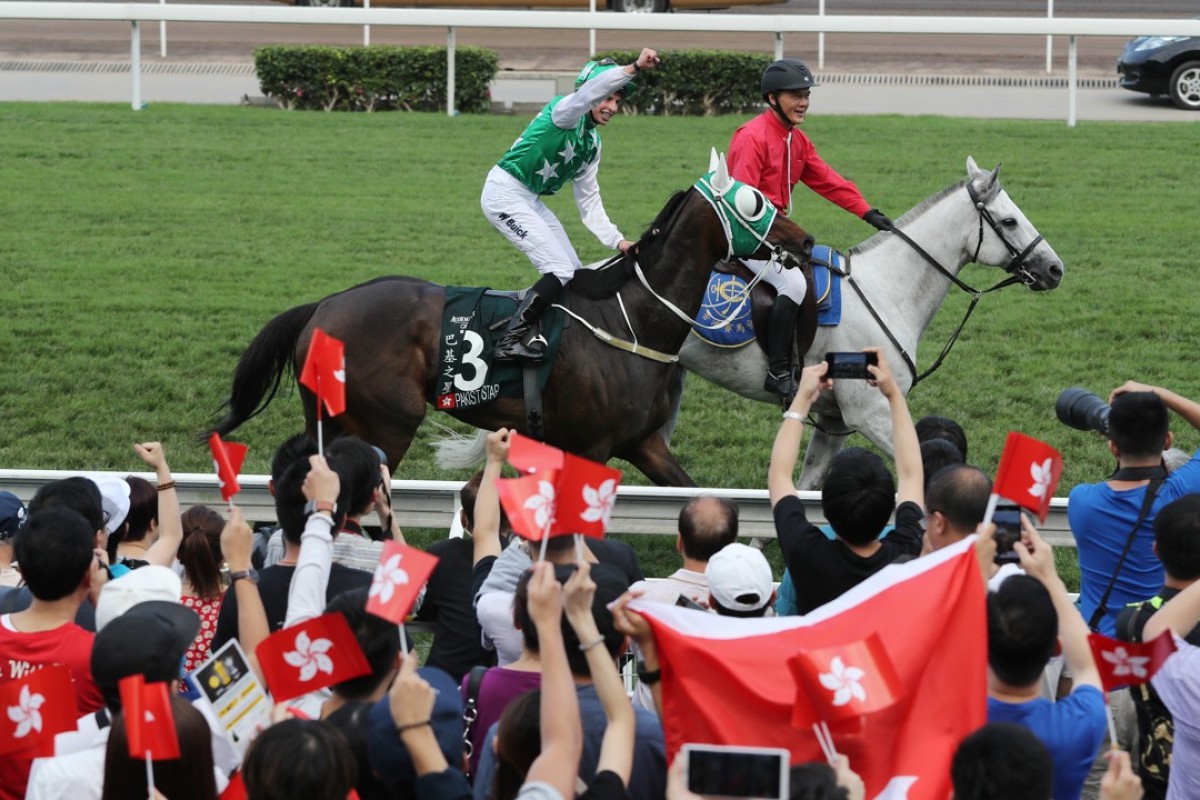 William Buick parades Pakistan Star in front of his loyal fans after winning the Group One QE II Cup in April. Photos: Kenneth Chan