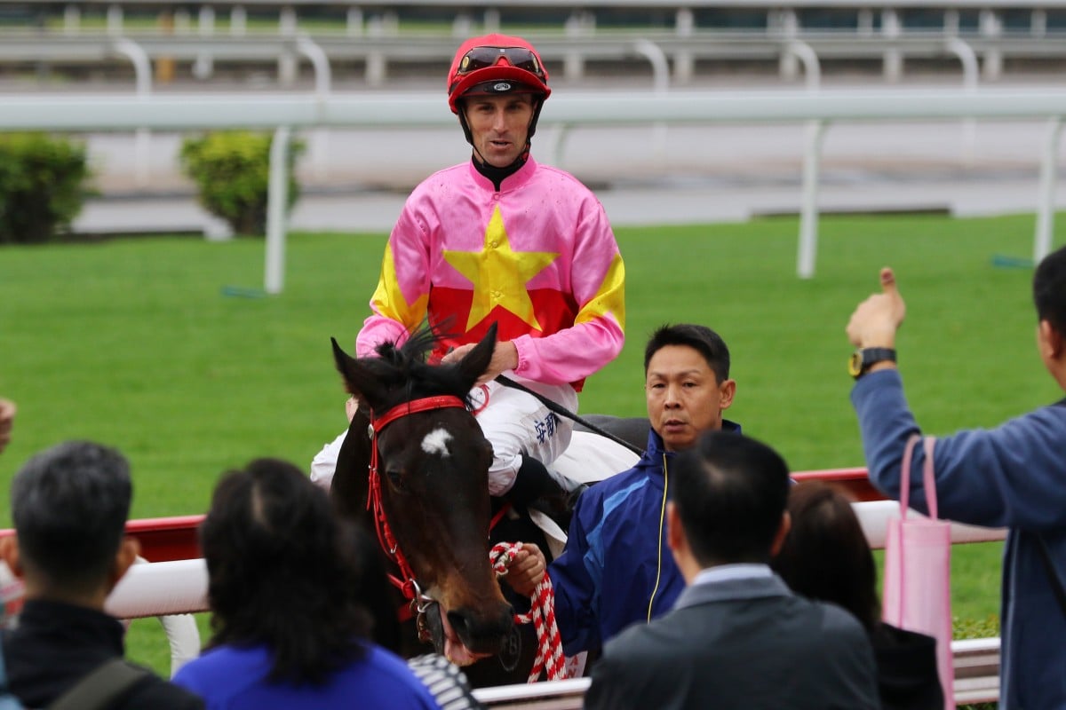 Tye Angland returns to scale after riding Follow Me to victory at Sha Tin on November 25. Photos: Kenneth Chan